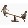 Boy and girl on Sseesaw